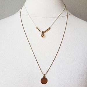 Gold tone necklace